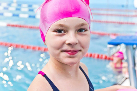 Photo of cute girl in swimming poolの写真素材