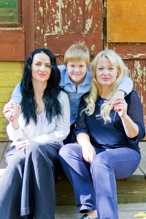 Portrait of two European women with one blonde boy
