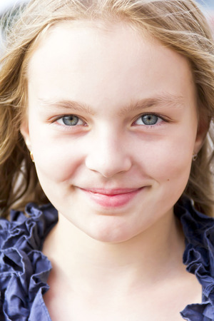 Portrait of cute girl with blond hairの写真素材