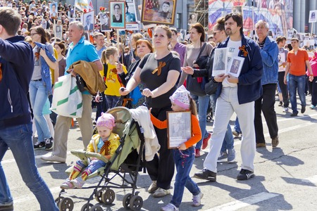 SAMARA, RUSSIA - MAY 9, 2016:  Procession of the people in Immortal Regiment on annual Victory Day, May, 9, 2016 in Samara, Russiaのeditorial素材