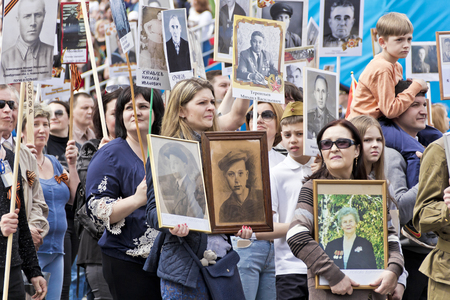 SAMARA, RUSSIA - MAY 9, 2017:  Procession of the people in Immortal Regiment on annual Victory Day, May, 9, 2017 in Samara, Russiaのeditorial素材