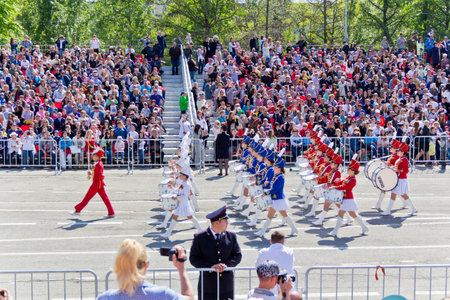 SAMARA, RUSSIA - MAY 9, 2016: Russian military women orchestra march at the parade on annual Victory...