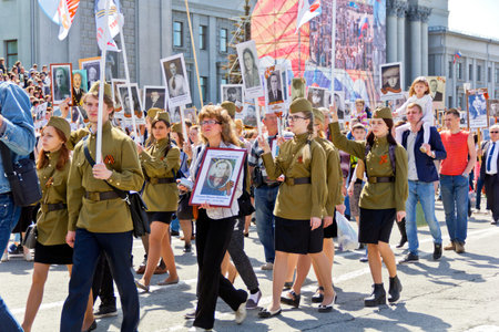 SAMARA, RUSSIA - MAY 9, 2016:  Procession of the people in Immortal Regiment on annual Victory Day,...