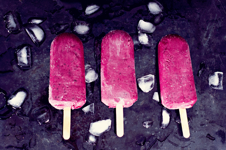 Berry ice cream. Ice cream from black currant, blueberries, raspberries.  Homemade of raspberries and currants, cooked with special forms.の写真素材