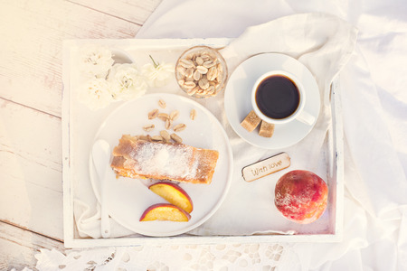 strudel with peaches, apples and peanuts.  Summer Breakfastの写真素材