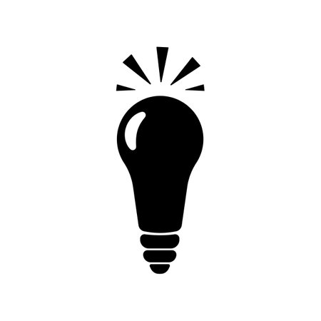 Burning lamp. The concept of a good idea, creative thinking, inspiration, brainstorming. Vector solid black icon isolated on a white backgroundのイラスト素材