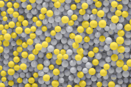 Illuminating yellow and Ultimate Gray balls background. Color year 2021. Abstract backdrop, close-up.の写真素材