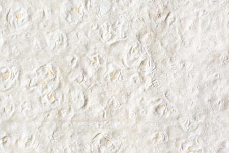 Beige dough sheet texture of Armenian Lavash bread, natural background.の写真素材