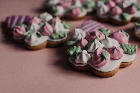 Cookies in a form of flowers. Spring concept. Candy bar. Birthday Wedding. Pink background.の写真素材