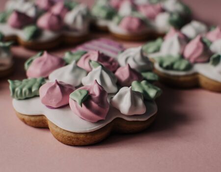Cookies in a form of flowers. Spring concept. Candy bar. Birthday Wedding. Pink background.の写真素材