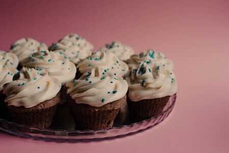 Tasty cupcakes on a pink background. Birthday cupcakes. Candy bar. Wedding. Partyの写真素材