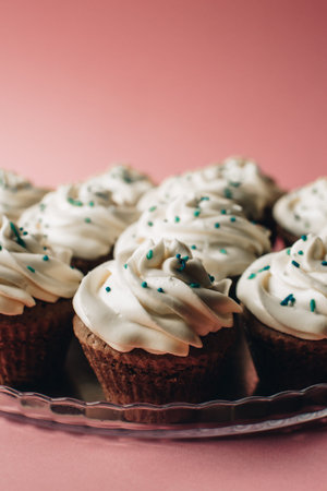 Tasty cupcakes on a pink background. Birthday cupcakes. Candy bar. Wedding. Partyの写真素材