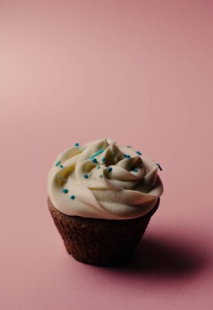 Tasty cupcakes on a pink background. Birthday cupcakes. Candy bar. Wedding. Partyの写真素材