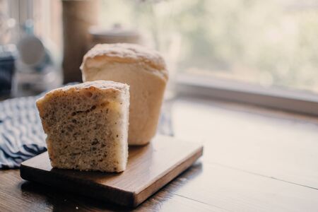 Bakery concept. Fresh home-made bread on the table. Bread on wooden table. Homemade bread. の写真素材