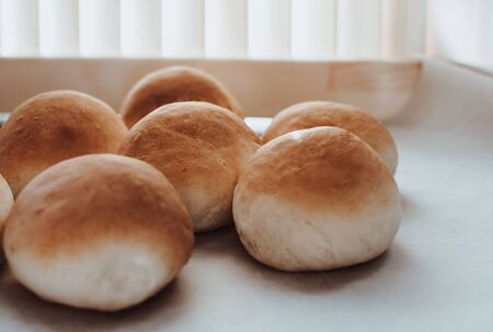 Bakery concept. Fresh home-made bread on the table.の写真素材