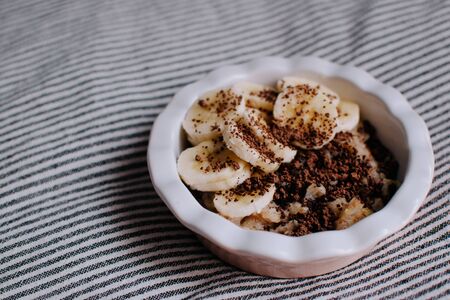 Breakfast in bed. Board with tasty breakfast on the bed.の写真素材