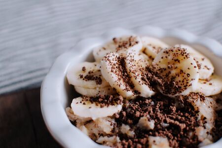 Breakfast in bed. Board with tasty breakfast on the bed.の写真素材