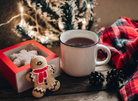 Christmas cookies. Flat lay winter cozy Christmas vintage background. The cup of tea or coffee. Christmas atmosphere.の写真素材