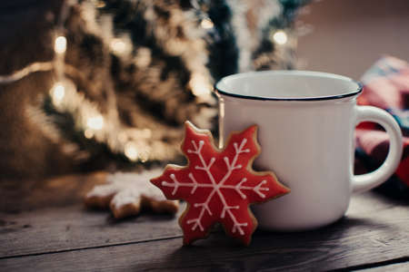 Christmas cookies. Flat lay winter cozy Christmas vintage background. The cup of tea or coffee. Christmas atmosphere.の写真素材