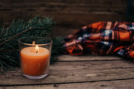 Flat lay winter cozy Christmas vintage background with copy space. Candle. Winter background. Christmas atmosphere. Christmas deer.の写真素材