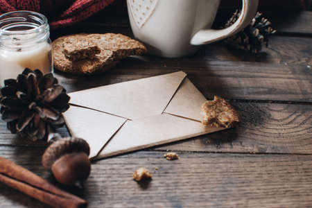 Christmas letter for Santa Claus. Scandinavian hygge styled Christmas composition. Cozy winter homely scene. Santa Claus working place. Flatlay. Home decor.の写真素材