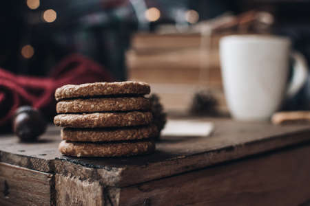 Scandinavian hygge styled Christmas composition. Cozy winter homely scene with cookies. Santa Claus working place. Flatlay. Home decor.の写真素材