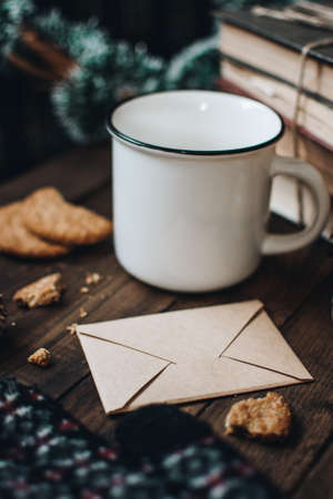Christmas letter for Santa Claus. Scandinavian hygge styled Christmas composition. Cozy winter homely scene. Santa Claus working place. Flatlay. Home decor.の写真素材