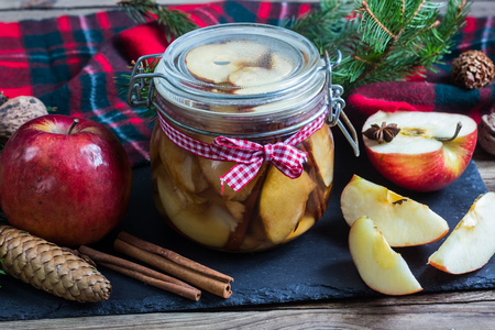 Homemade Apple Pie Vodka in jar. winter scenery. Selective focusの写真素材