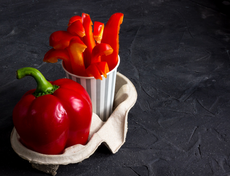 Healthy food concept: fresh vegetables snack - carrots and sweet pepper. Selective focusの写真素材