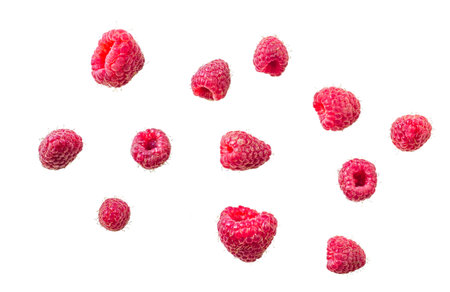 Collection of ripe red raspberries isolated on white background