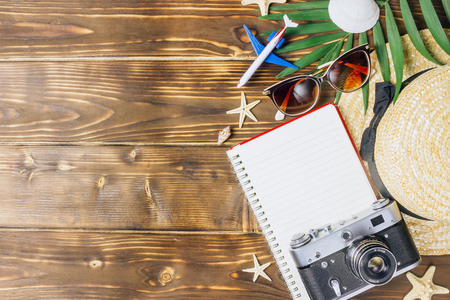 Flat lay traveler accessories on wooden  with blank space for text.の写真素材