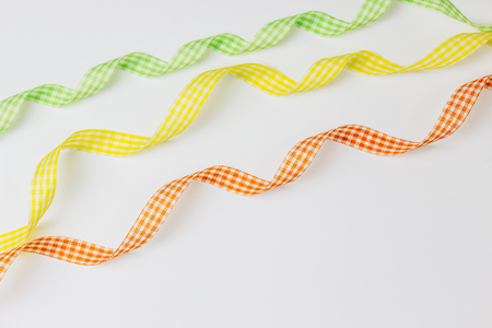 check ribbons on white background with copy space. Top view.の写真素材