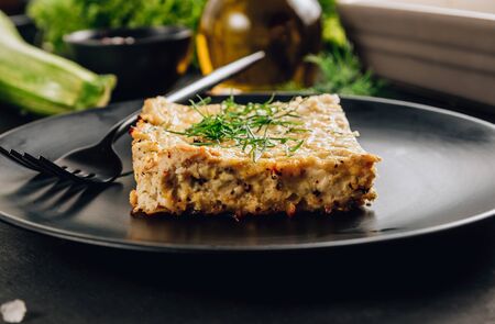 Zucchini casserole on darkの写真素材