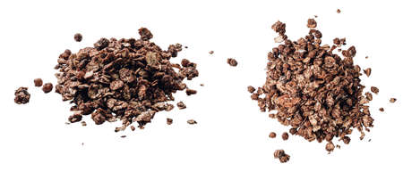 Set of crunchy chocolate granola pile isolated on white background. Top view and selective focusの写真素材