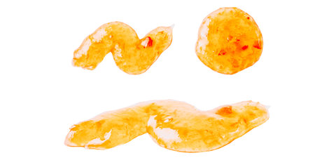 Sweet apricot jam on white background