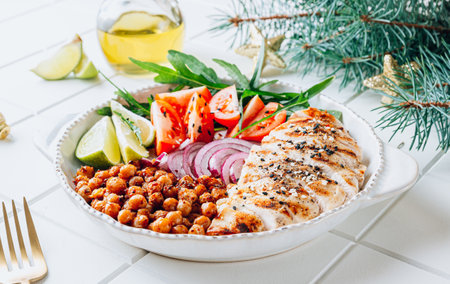 Spicy Chicken Nourish Bowl - A filling and nutritious warm salad with grilled chickenの写真素材