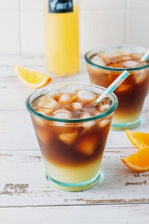 Trendy summer seasonal refreshing drink Bumble coffee on white background. Cold coffee recipe.の写真素材