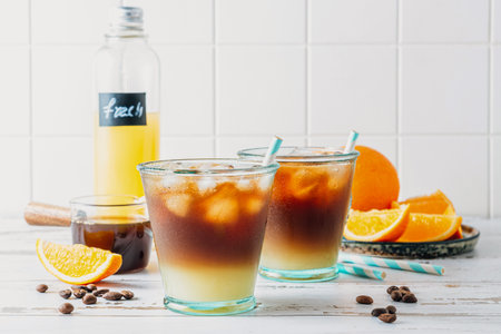 Trendy summer seasonal refreshing drink Bumble coffee on white background. Cold coffee recipe.の写真素材
