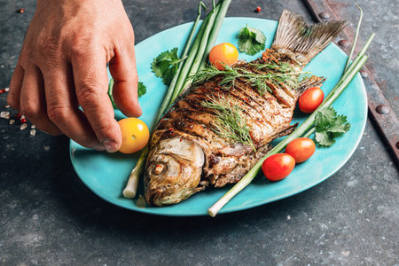 Fried Carp on Blue Plate