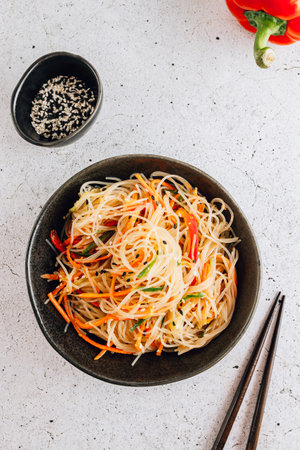 Vegan Funchoza salad. Asian salad with fresh vegetablesの写真素材