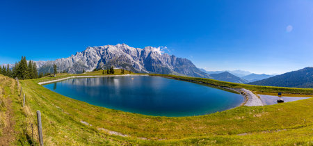 Panoramic view of the lake in the Alps.