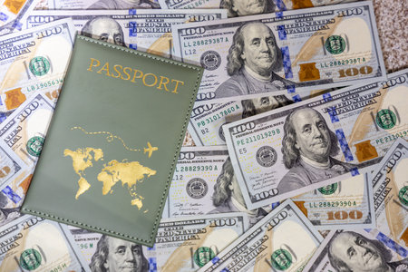 passport on the background of dollars. The concept of travel and tourismの写真素材