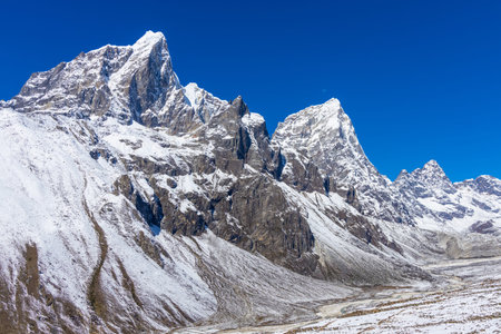 Everest Base camp trek hike after the snowfall in October. Himalaya mountains, Nepal. Everest Base...