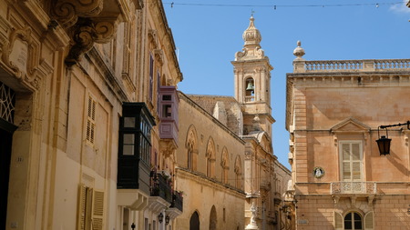Mdina, Malta. View from St, PaulÂ´s Square. At the center, the tower of the Carmelite Priory. Just at its left, a partial view of Palazzo Santa Sofia. ItÂ´s groundfloor was built in the 13th century.の写真素材