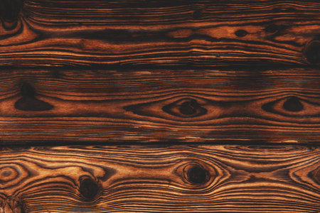 Textured abstract brown backgroun. Wooden old wall. Top view.