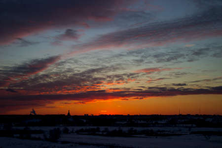 Blue orange sunset sky. Nature multicolored background.の写真素材