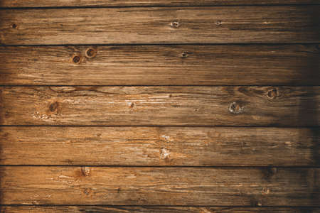 Abstract brown wood background texture. Vintage wooden dark horizontal boards. Wooden old wall. Top view.の写真素材