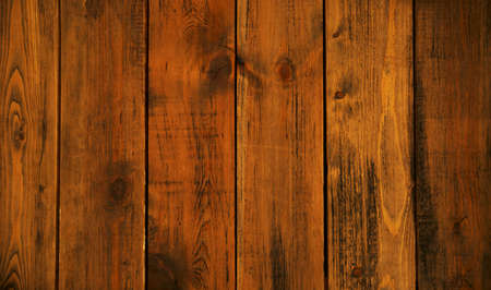 Abstract brown wood background texture. Vintage wooden dark vertical boards. Wooden old wall. Top view.の写真素材