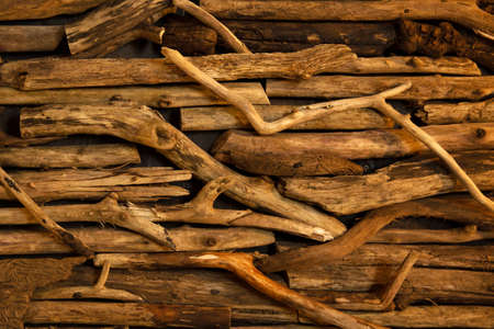 Abstract wooden background made of short sticks. Front view with copy space.の写真素材