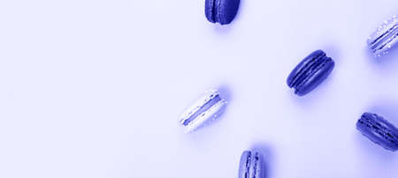 Macarons. Trendy color 2022. Very peri color background.の写真素材
